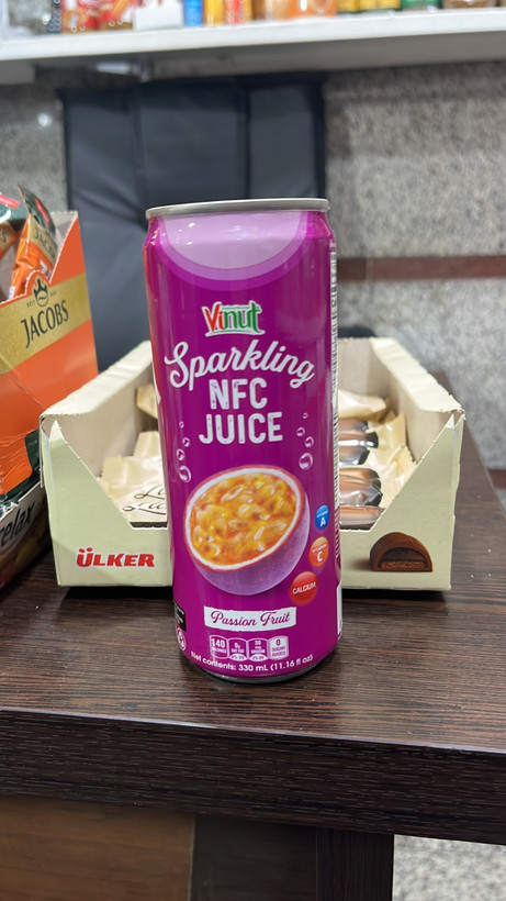 نوشیدنی گازدار با طعم پشن فروت(Vinut Sparkling NFC Juice Passion Fruit )